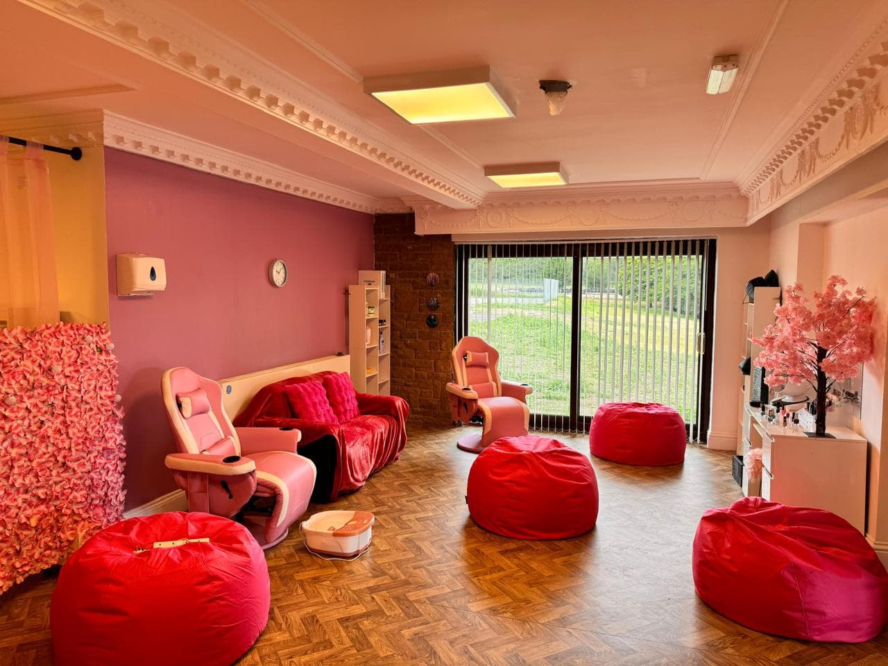 Pamper room with decorative flower wall for life skills activities