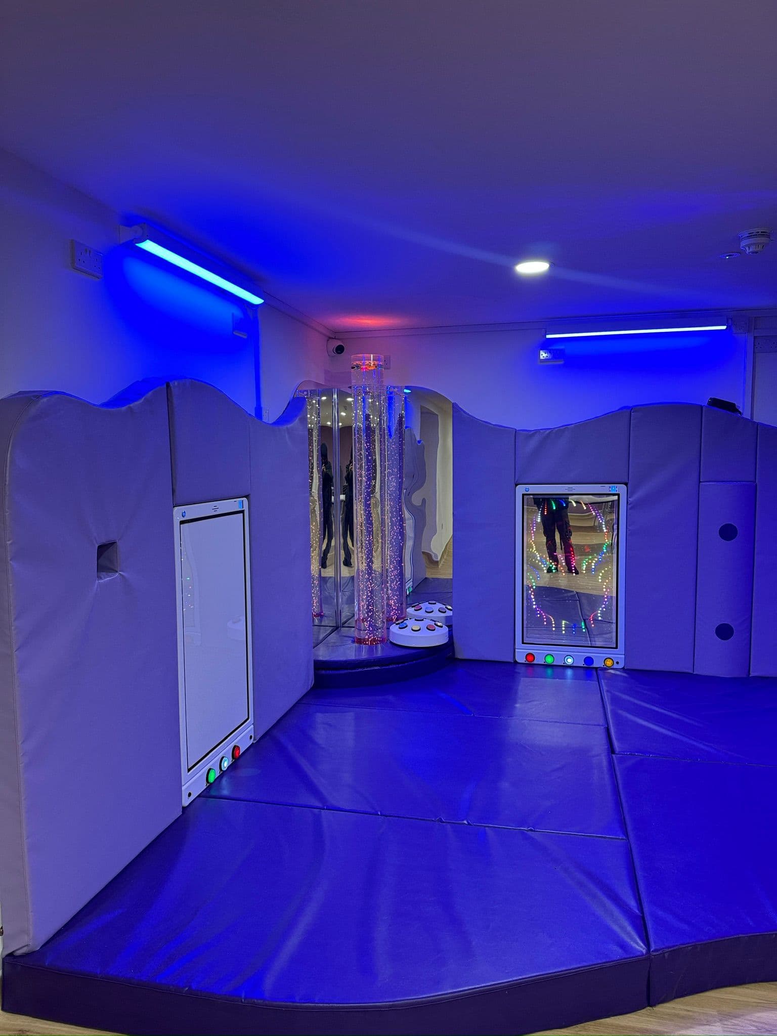 Sensory room with calming blue lighting and fibre optics
