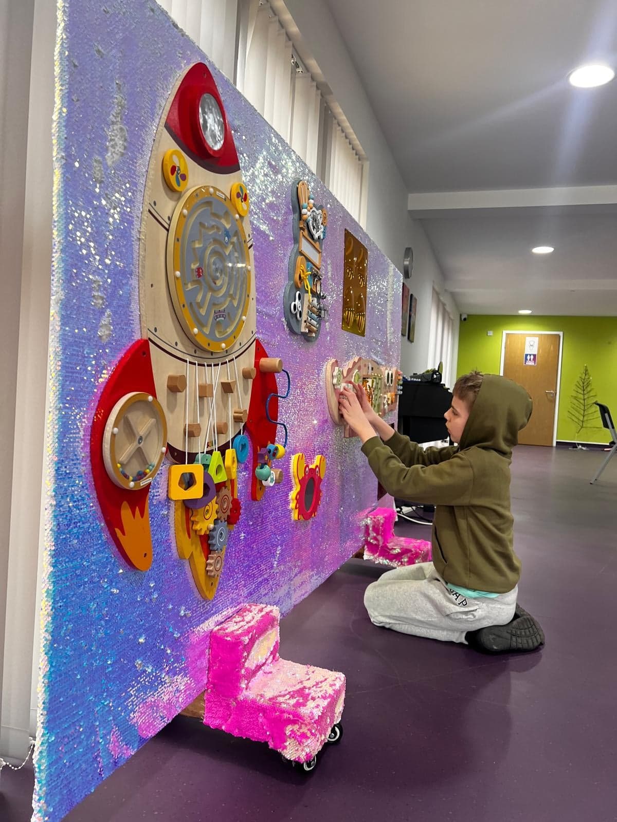 Clean white activity room for focused creative work